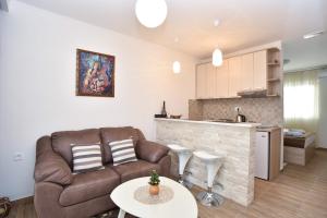 Kuchyň nebo kuchyňský kout v ubytování Apartments Royal