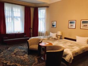 Postel nebo postele na pokoji v ubytování Hotel Castell am Kurfürstendamm + 37 fotografií
