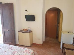 TV a/nebo společenská místnost v ubytování Camping Villaggio Egad
