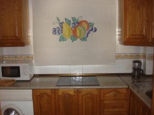 Kuchyň nebo kuchyňský kout v ubytování Apartamentos SOL y PLAYA Torremolinos