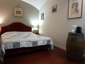 Rúm í herbergi á Ristorante Albergo Corona