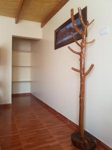 Uma TV ou centro de entretenimento em Hostal Ckamai