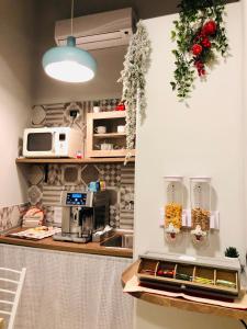 Kuchyň nebo kuchyňský kout v ubytování B&B Pantarei Napoli