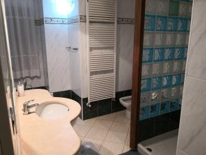 Koupelna v ubytování Leo home