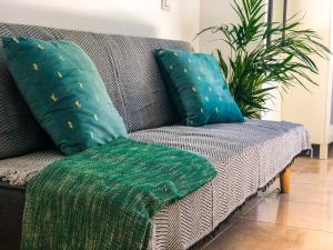 Łóżko lub łóżka w pokoju w obiekcie Aloe Studio