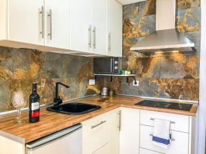 Kuchnia lub aneks kuchenny w obiekcie Aloe Studio