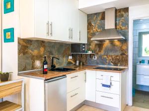 Kuchnia lub aneks kuchenny w obiekcie Aloe Studio