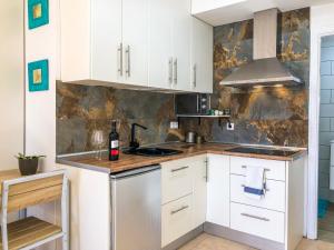Kuchnia lub aneks kuchenny w obiekcie Aloe Studio