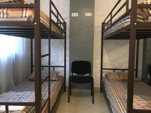 Postel nebo postele na pokoji v ubytování FOX Hostel