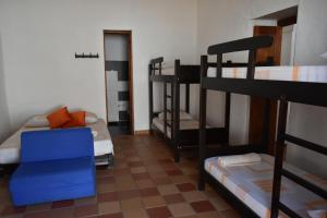 Poschodová posteľ alebo postele v izbe v ubytovaní Hospedaje Don Juan