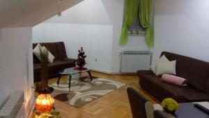 Posezení v ubytování Apartment VILLA MERCI