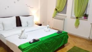 Postel nebo postele na pokoji v ubytování Apartment VILLA MERCI