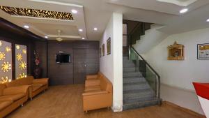TV a/nebo společenská místnost v ubytování Hotel Jyoti