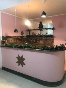 a counter at a restaurant with christmas decorations at Villa belvedere in Pontecagnano