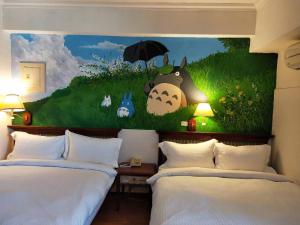 Katil atau katil-katil dalam bilik di Little Paradise Inn