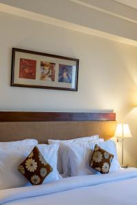 Postel nebo postele na pokoji v ubytování Park Ornate Hotel Viman Nagar