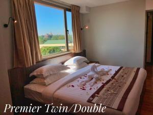 Katil atau katil-katil dalam bilik di Hotel Rose Hill