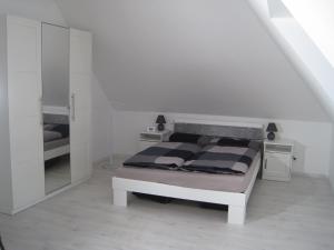 Ένα ή περισσότερα κρεβάτια σε δωμάτιο στο Töfte Bude