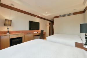 Voodi või voodid majutusasutuse The Rivero Hotel toas