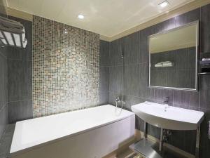 Koupelna v ubytování Royal Group Motel Buo Ai Branch
