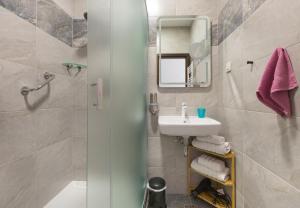 Koupelna v ubytování Palace Apartments by ZGrent
