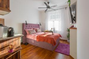 Postel nebo postele na pokoji v ubytování Palace Apartments by ZGrent