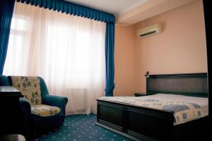 
Кровать или кровати в номере Отель Пальма
