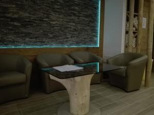 Część wypoczynkowa w obiekcie Hotel Denny