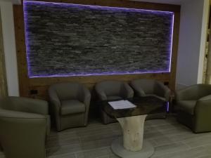 Część wypoczynkowa w obiekcie Hotel Denny