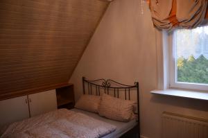 เตียงในห้องที่ Bickbargen - Haus mit 4 Schlafzimmern und Platz