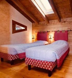 Letto o letti in una camera di Chalets Mignon