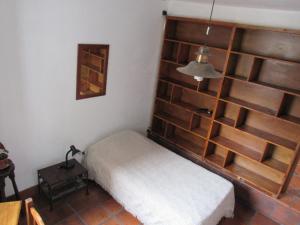 Una cama o camas en una habitación de Casa Güemes