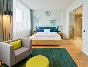 Postel nebo postele na pokoji v ubytování Hotel Federwerk