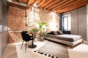A seating area at OFFICINE CAVOUR Piazza Cavour