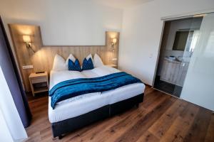 Posteľ alebo postele v izbe v ubytovaní Aktiv Hotel Karnia