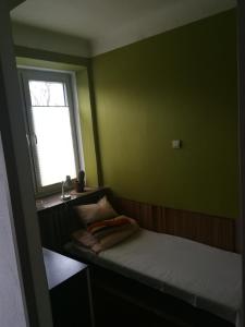 Posteľ alebo postele v izbe v ubytovaní Hostel Tolek