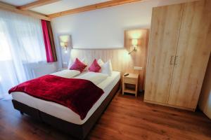 Posteľ alebo postele v izbe v ubytovaní Aktiv Hotel Karnia