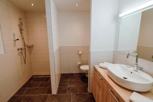 Kúpeľňa v ubytovaní Aktiv Hotel Karnia