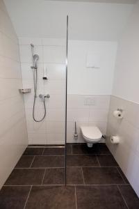 Kúpeľňa v ubytovaní Aktiv Hotel Karnia