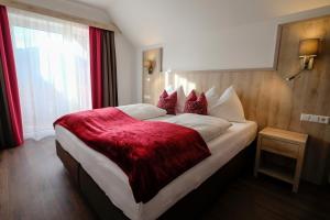 Posteľ alebo postele v izbe v ubytovaní Aktiv Hotel Karnia