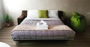 A bed or beds in a room at Ca' dell'Angelo