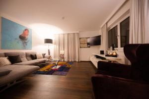 TV a/nebo společenská místnost v ubytování da Peatala Apartments