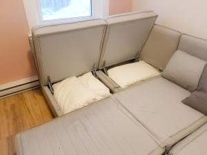 Postel nebo postele na pokoji v ubytování Ottawa Stay Downtown Suites