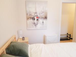 Postel nebo postele na pokoji v ubytování Ottawa Stay Downtown Suites