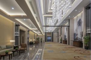 Fotografie z fotogalerie ubytování Shenyang Huaqiang Novlion Hotel v destinaci Daoyi