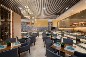 Restaurace v ubytování Shenyang Huaqiang Novlion Hotel