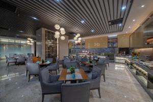 Posezení v ubytování Shenyang Huaqiang Novlion Hotel