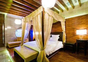 Postel nebo postele na pokoji v ubytování Royal Group Motel Ming Zu Branch