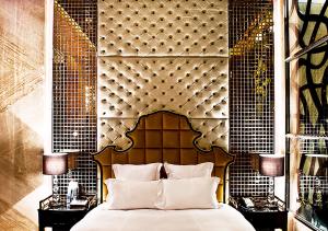 En eller flere senge i et værelse på Royal Group Motel Ming Zu Branch