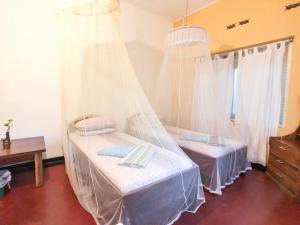 Letto o letti in una camera di Chami's Place